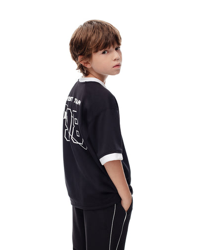 Camiseta oversize negra estampada niño