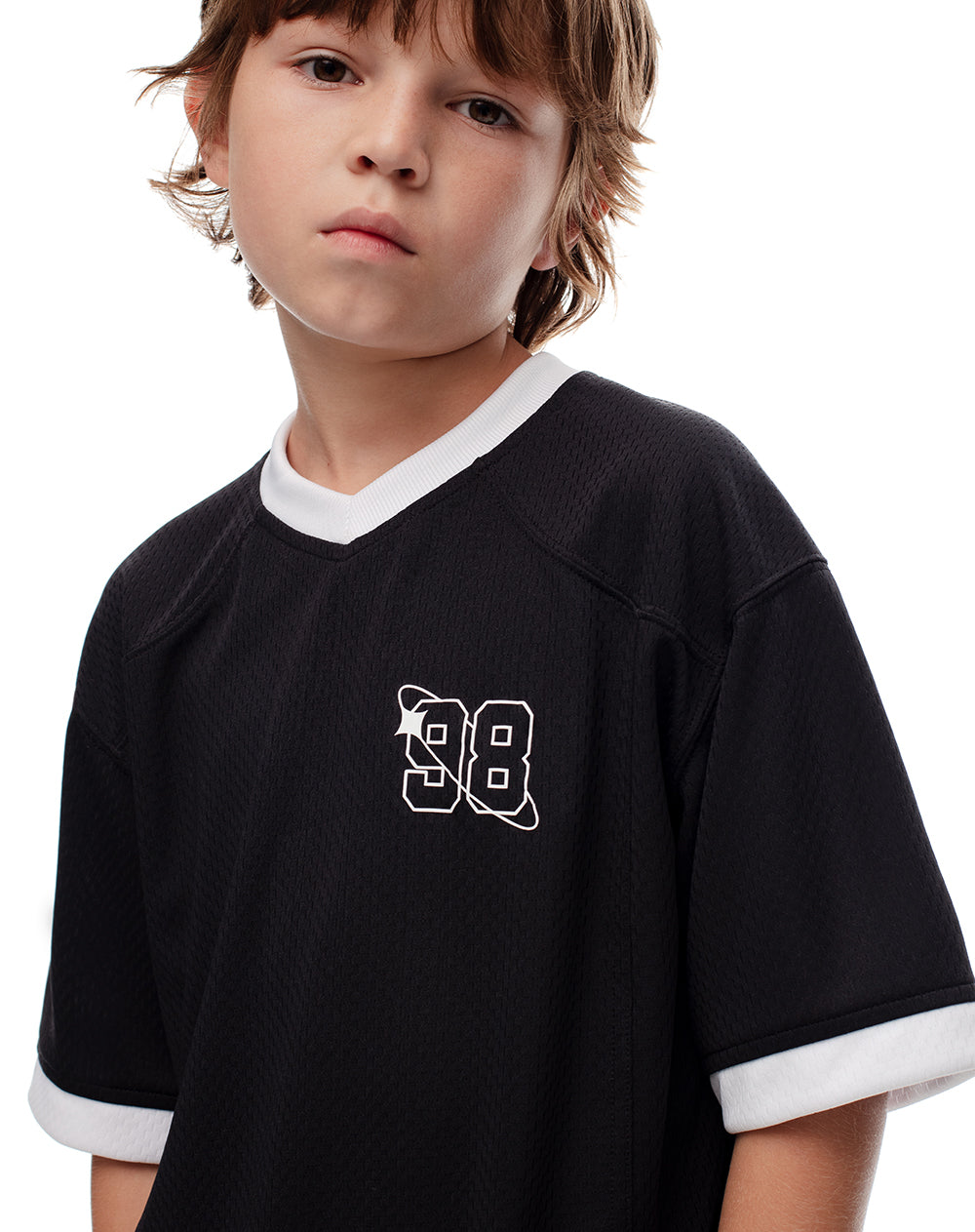 Camiseta oversize negra estampada niño