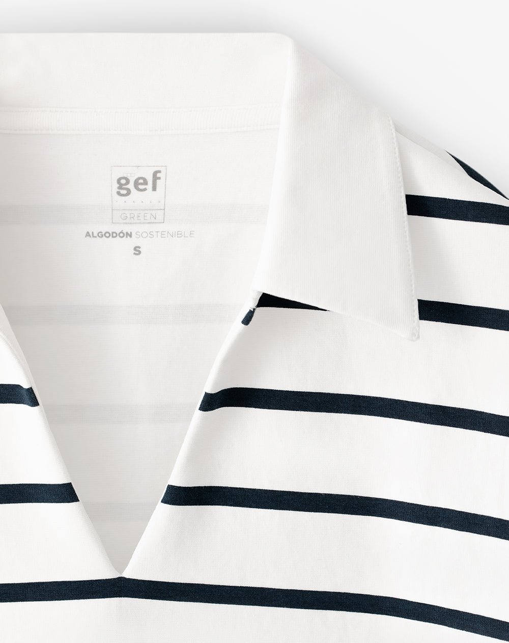 Camibuzo tipo polo oversize blanco rayas mujer