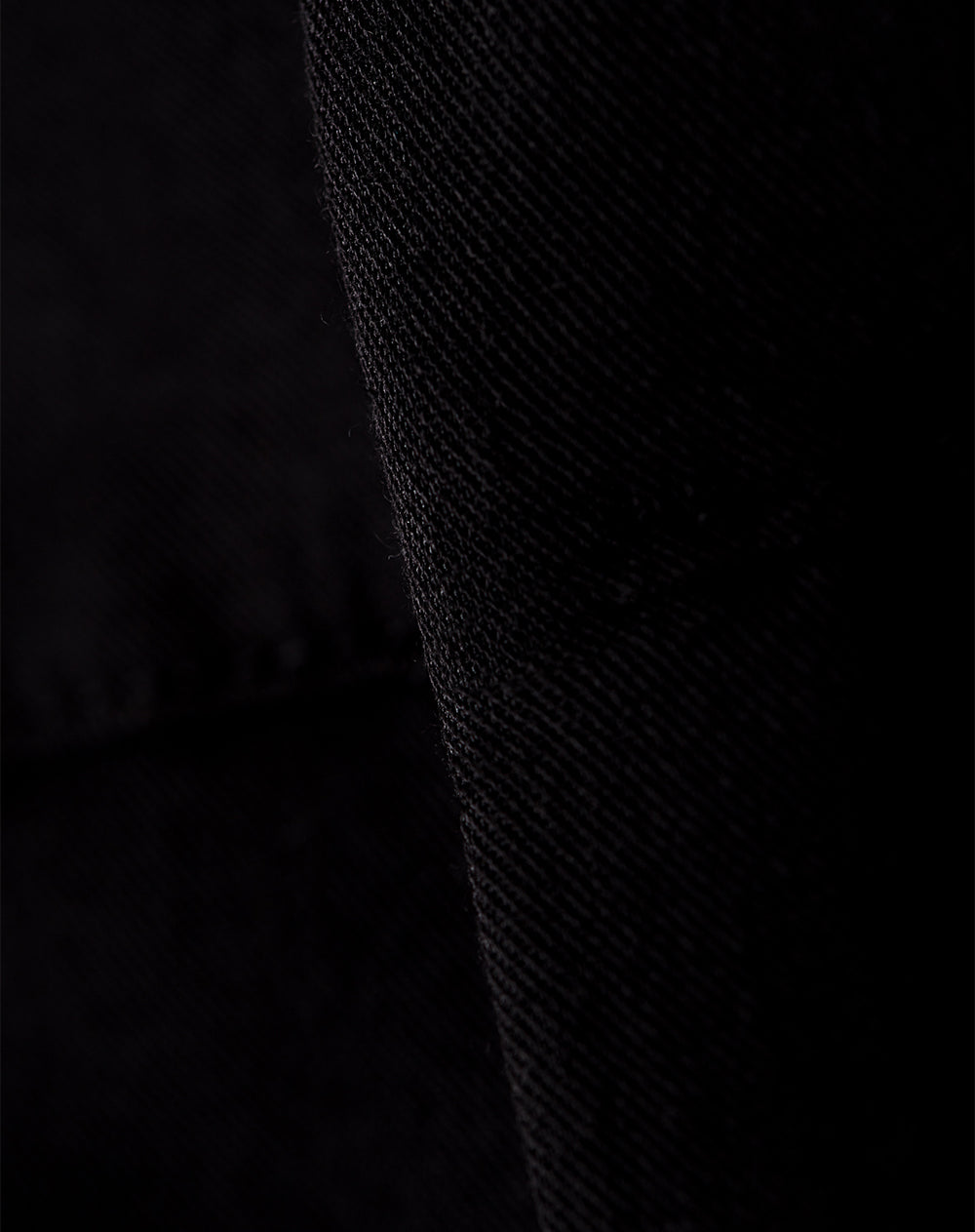Pantalón tiro medio bolsillos laterales negro para mujer