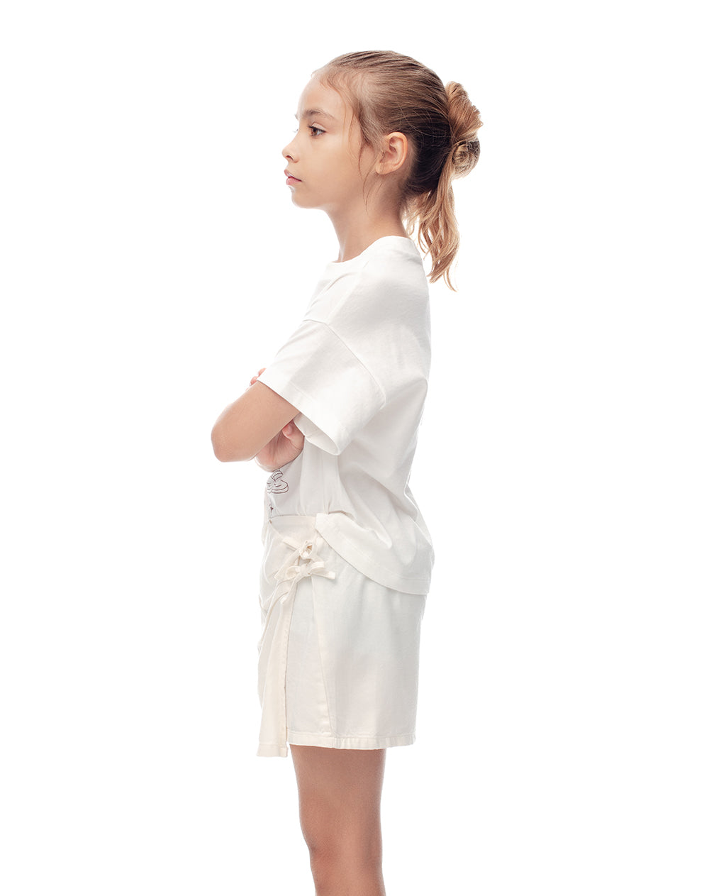 Falda short tiro medio crema niña