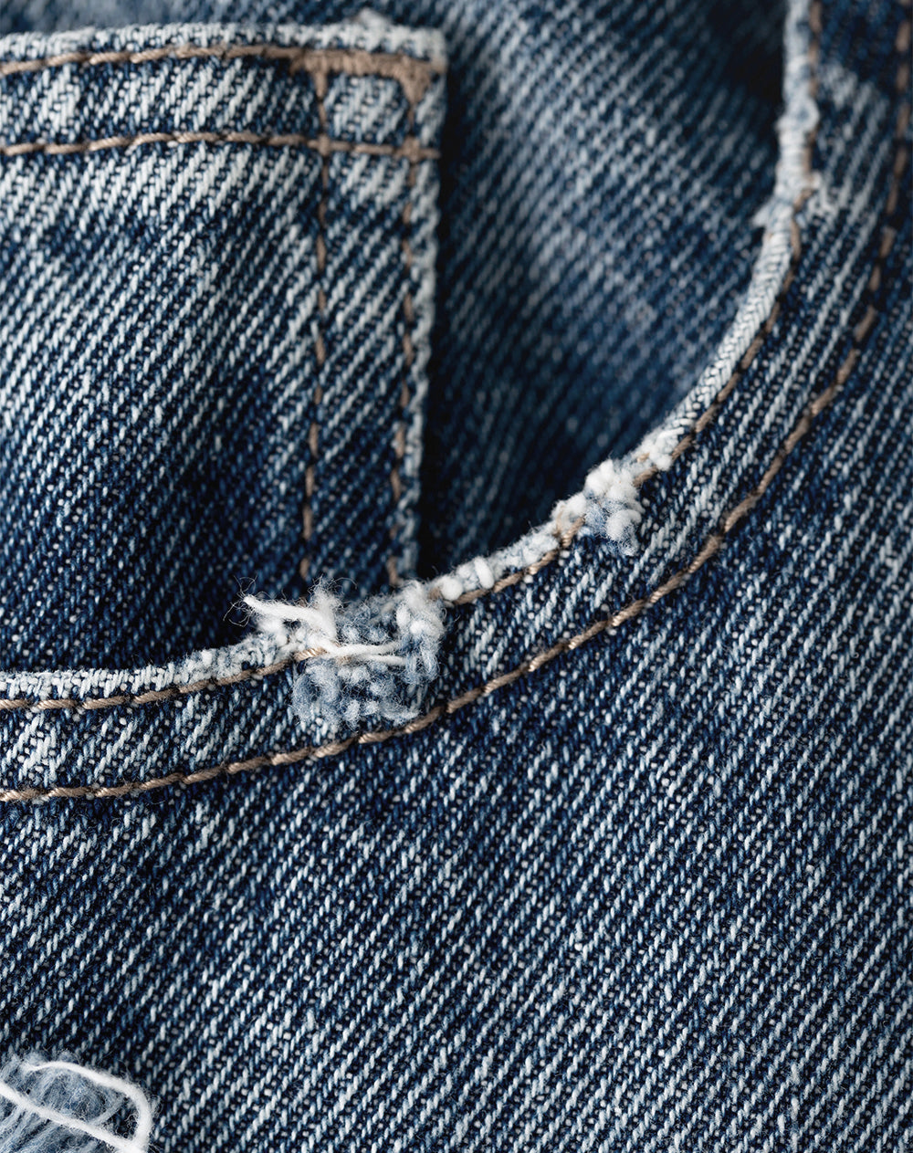 Jean mom fit fit tiro alto indigo medio