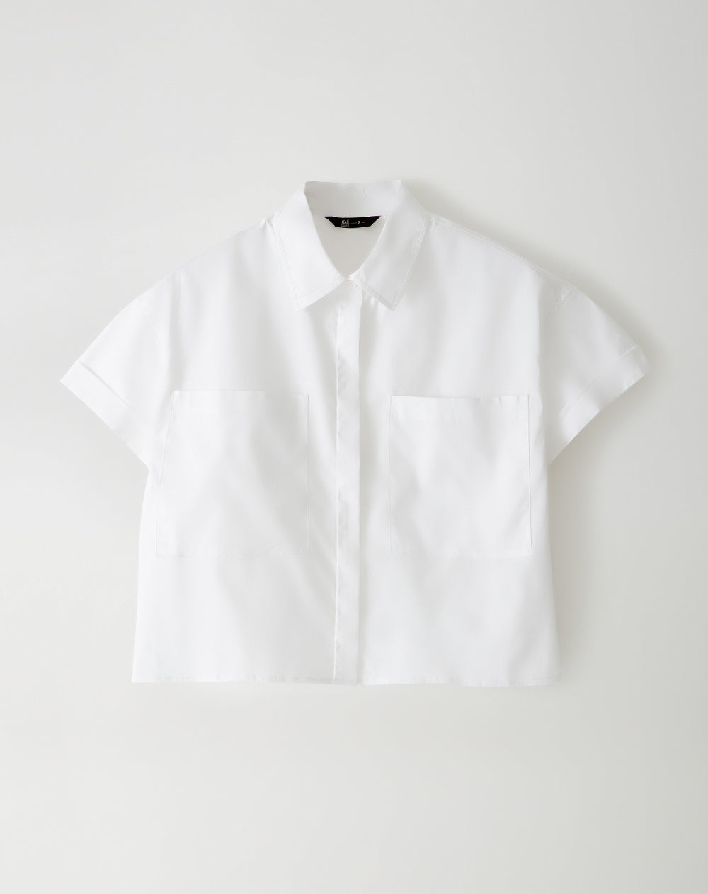 Camisa oversized fit manga corta blanca