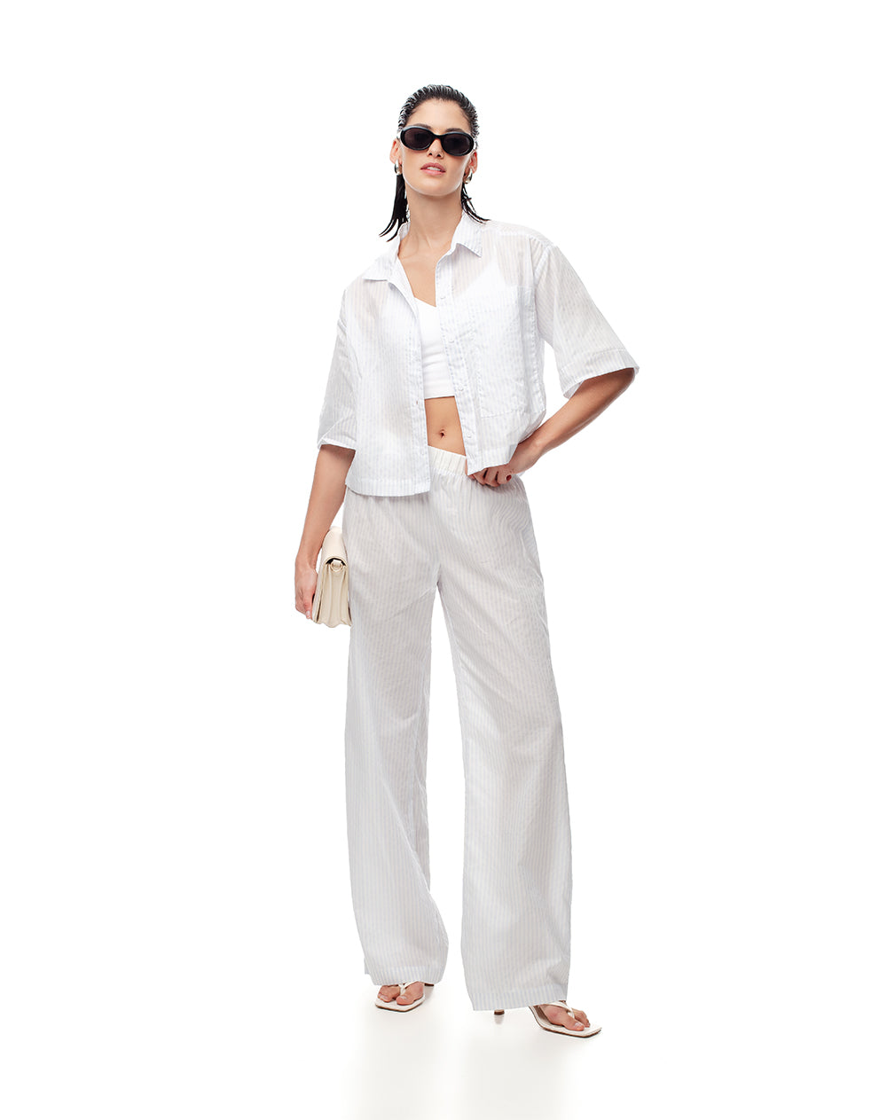Pantalón relaxed fit tiro alto rayas azules
