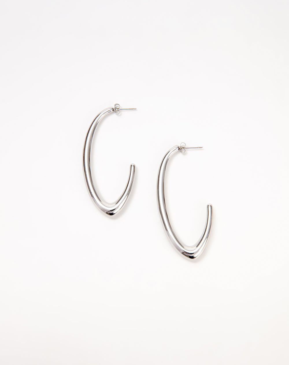 Aretes tipo aro alargado plateado