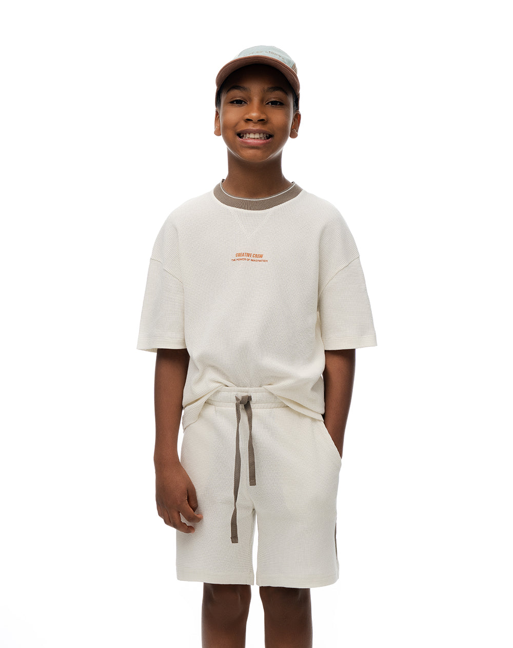 Bermuda regular algodón texturizada vainilla niño