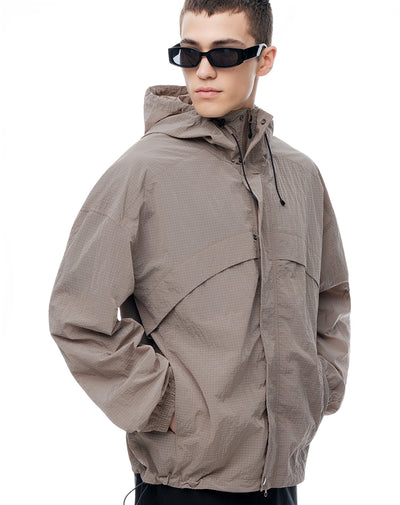 Chaqueta rompevientos café cuadros hombre