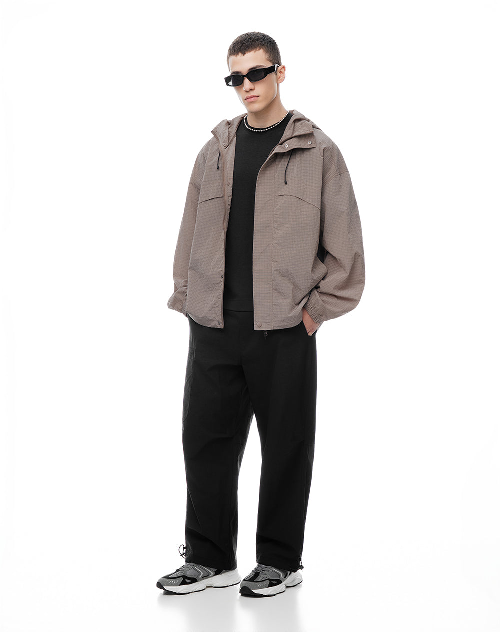 Chaqueta rompevientos café cuadros hombre