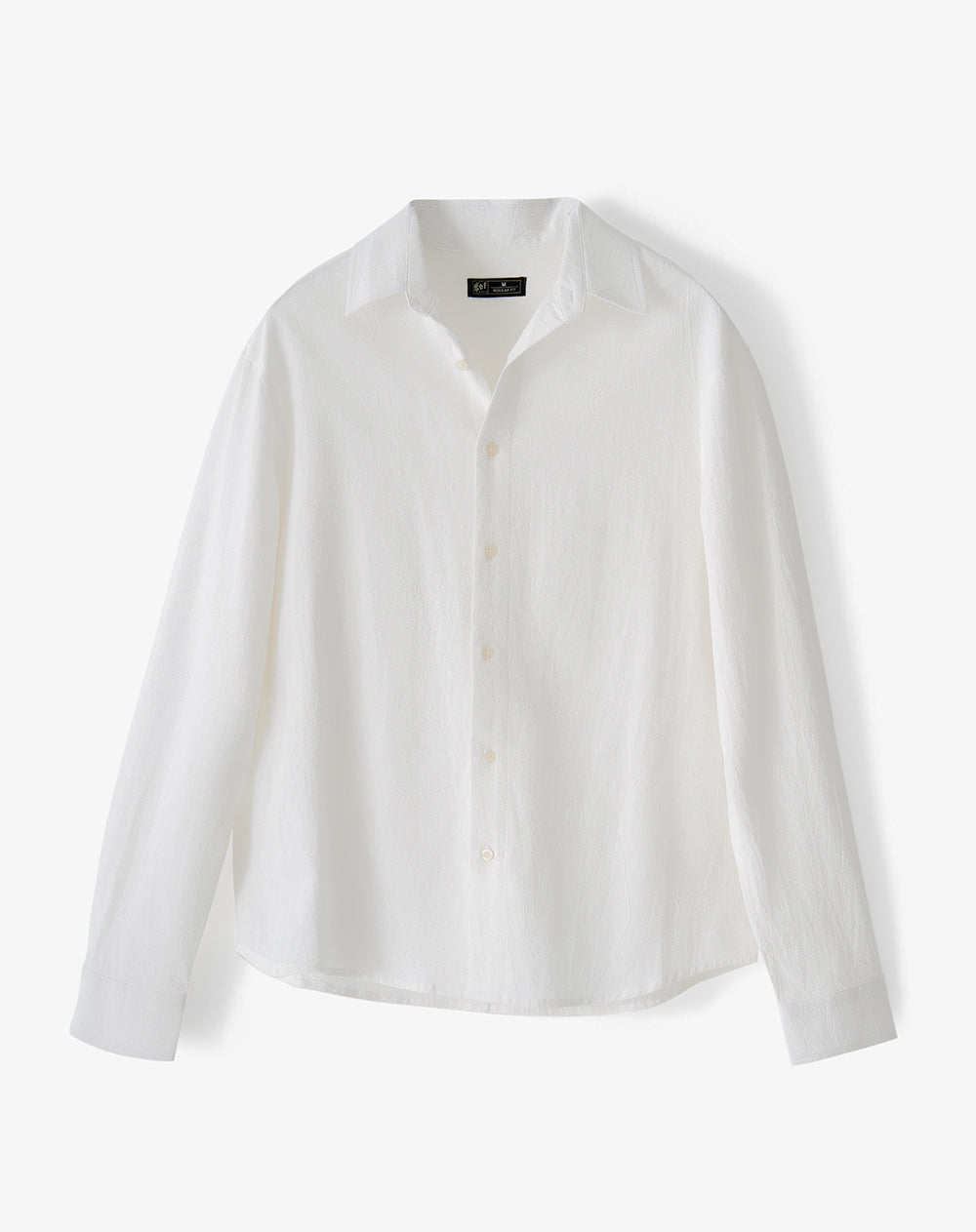 Camisa manga larga loose algodón blanca hombre