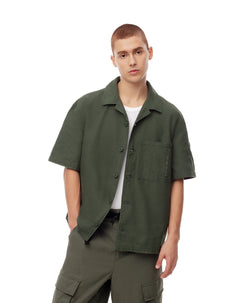 Camisa oversized fit manga corta verde