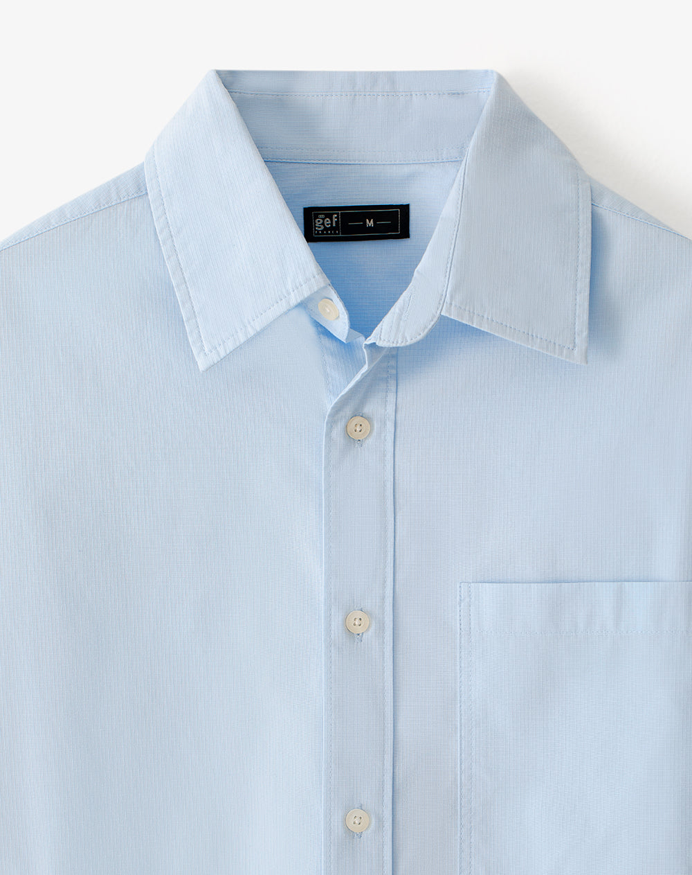 Camisa loose fit manga larga azul