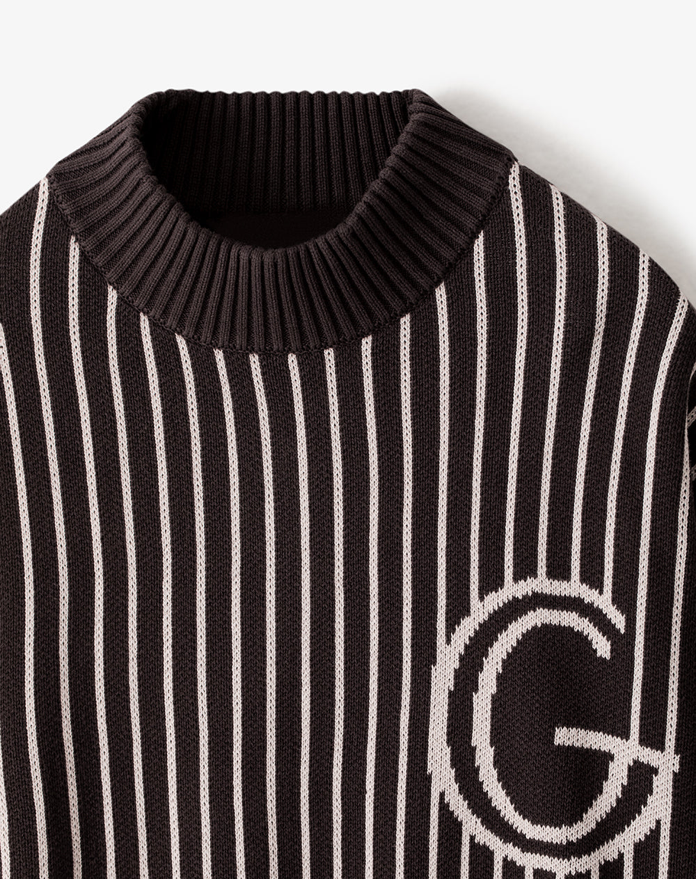 Buzo relaxed fit cafe rayas