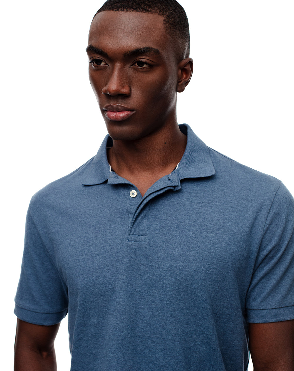 Polo slim fit azul jaspeada