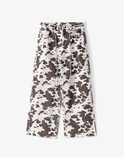 Pantalón loose fit tiro medio en drill crudo estampado