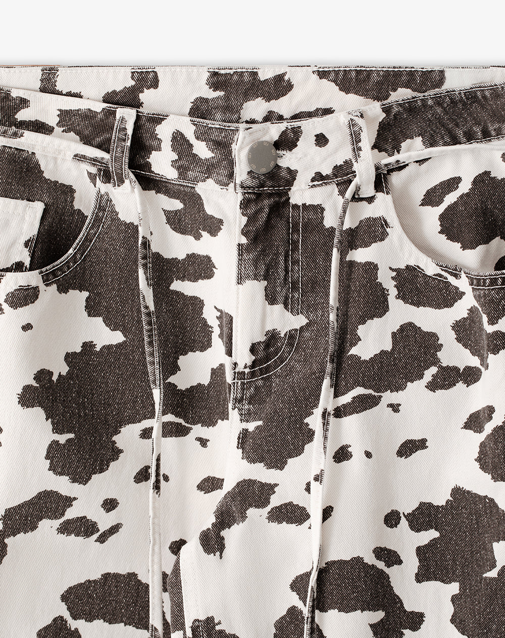 Pantalón loose fit tiro medio en drill crudo estampado