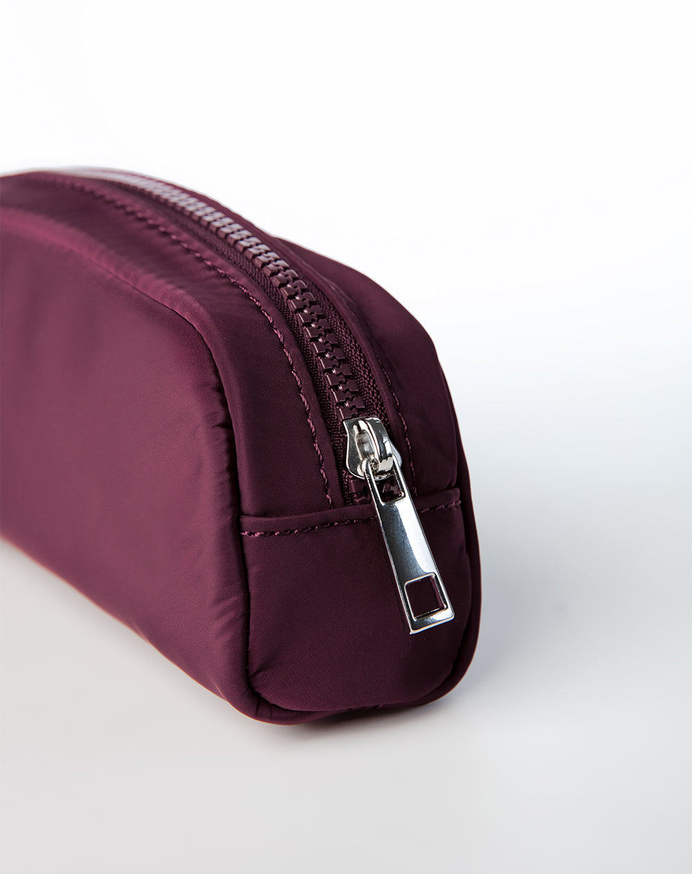Estuche vinotinto